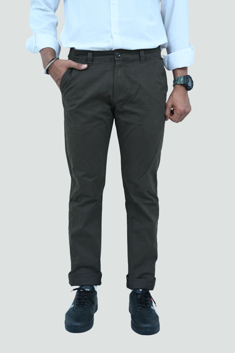 Men's Olive tapered fit cotton trouser with front view by Quiet Soul worn by model against grey background